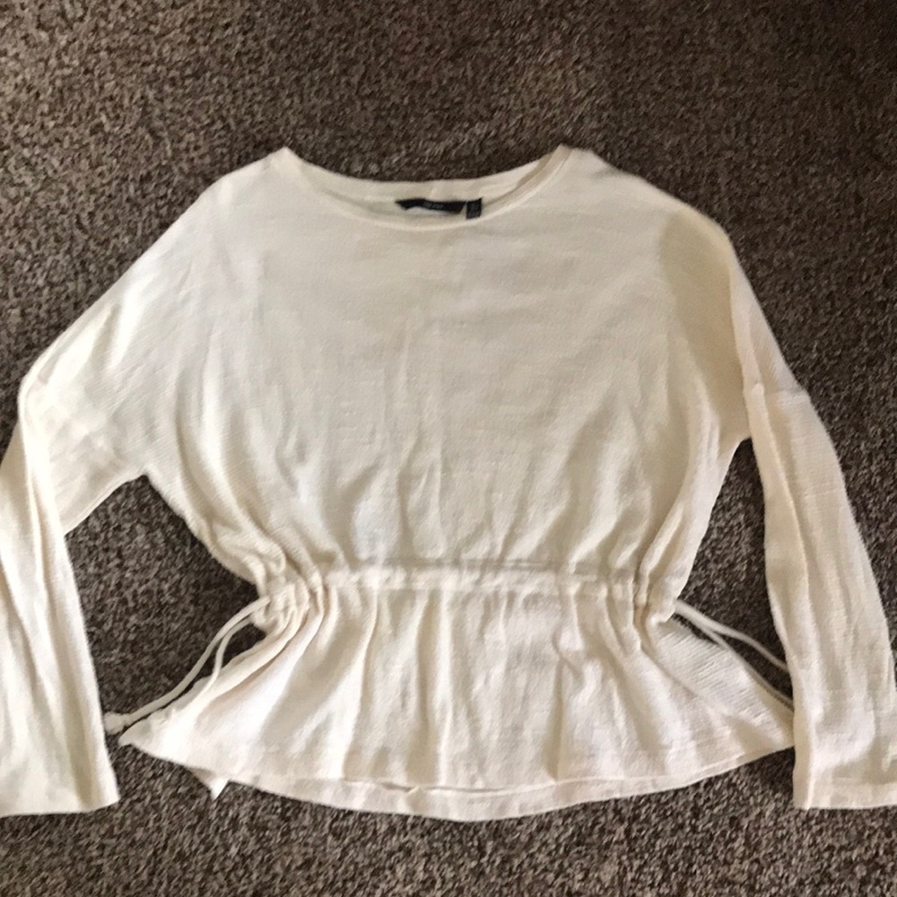 Cream long sleeve shirt